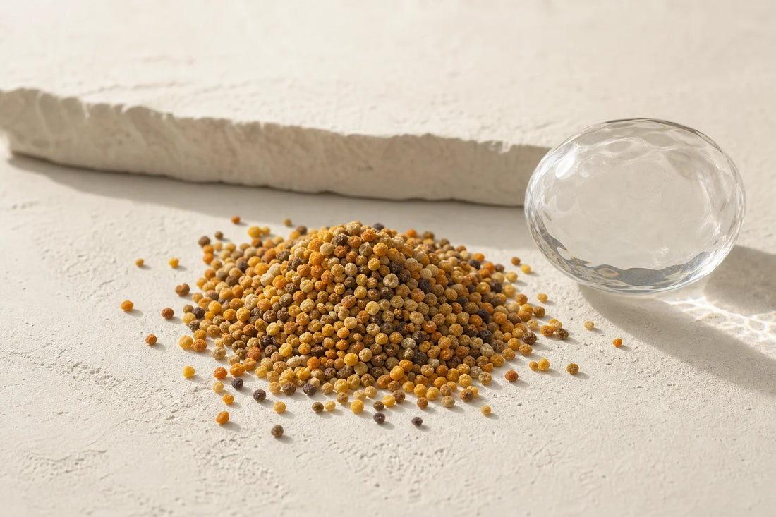 Close-up of raw bee pollen granules showing natural color and texture variation